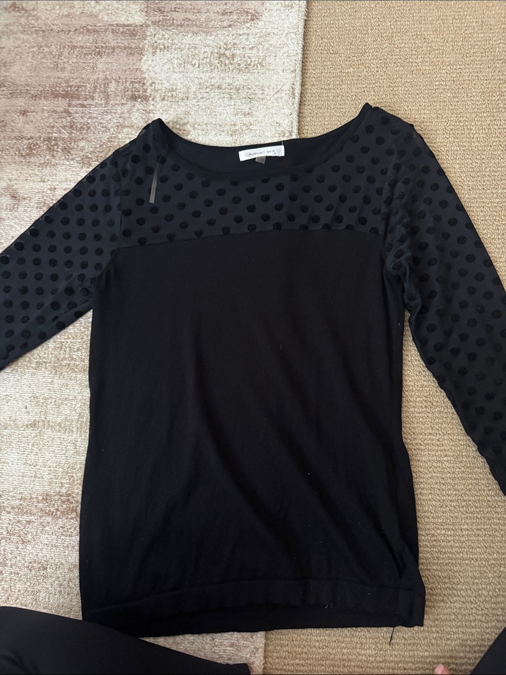 Black top with sheer sleeves